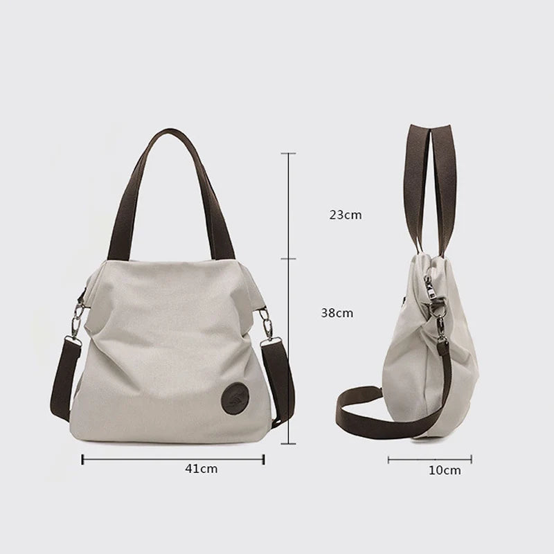 Large Pocket Canvas Tote Bag with Leather Accents – Casual Women’s Handbag